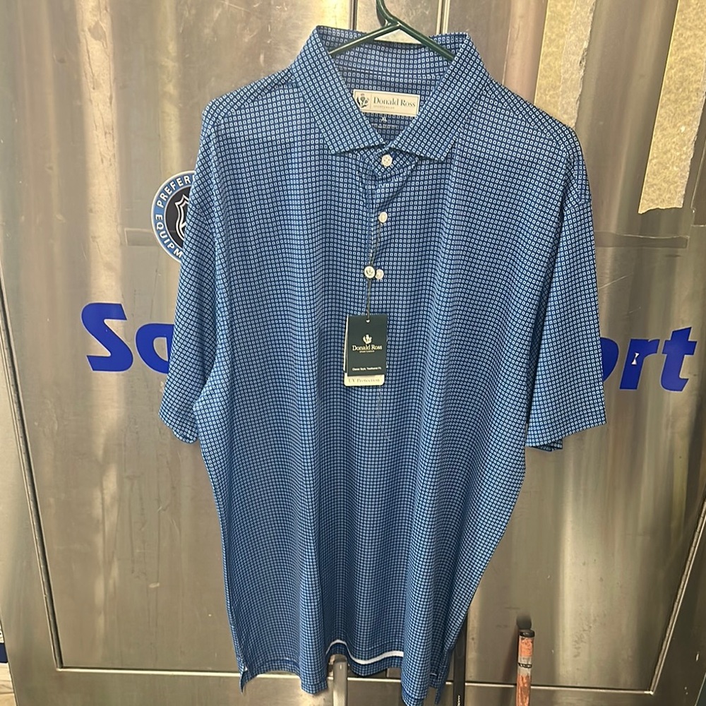 Blue Performance Polo Shirt for Athletic Wear. Cocheco country club Dover nh